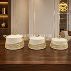 Three piece ivory cream insulated hotpot set with gold handles and honeycomb design wooden bg