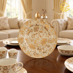 Johanson Bros gold-pattern dinner plate close-up