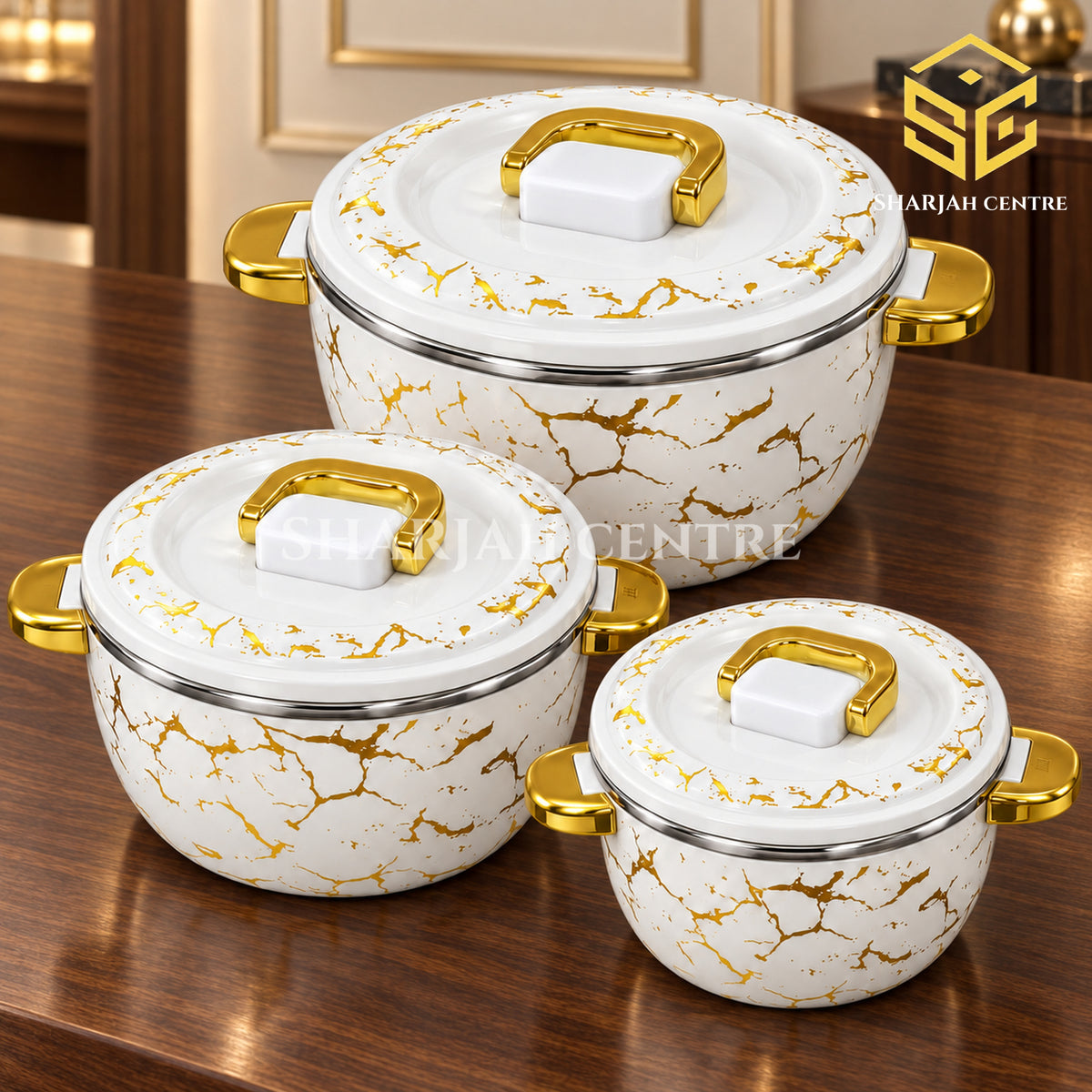 Billi white gold marble hotpot set with gold handles on a luxury walnut table