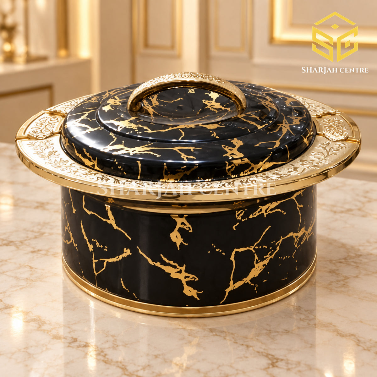 Ornate black marble and gold insulated hotpot displayed in a luxury interior