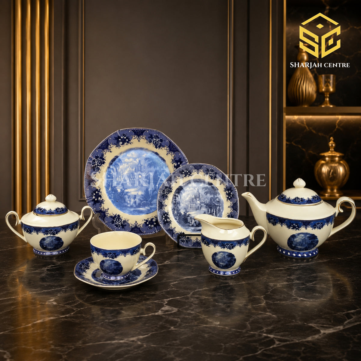 24-piece Super Bone tea set with 6 person serving, blue landscape scenes, floral borders and gold-tone edging color bg