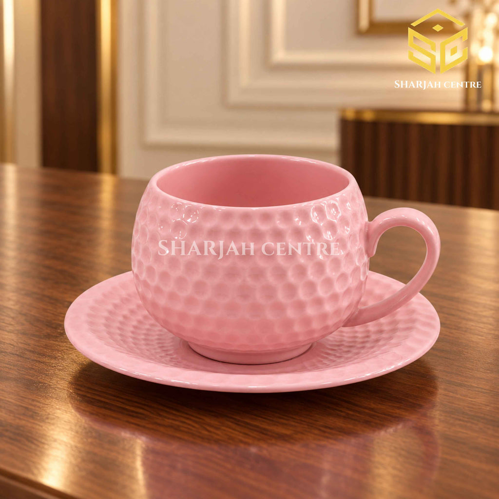 blush pink cup and saucer, pebble texture, luxury tea cup, wooden table setting, Sharjah Centre Multan