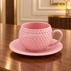 blush pink cup and saucer, pebble texture, luxury tea cup, wooden table setting, Sharjah Centre Multan