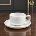 Contan white cup and saucer, square handle, wide tea cup, minimalist crockery, wooden table setting, Sharjah Centre Multan