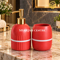 Red and gold 2-piece bathroom set CZT-34 with soap dispenser and tumbler at Sharjah Centre Multan