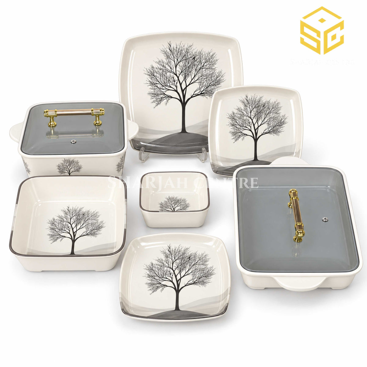 Glamour square dinnerware with black tree silhouettes, grey detailing and smoky-grey lids is arranged against a white background.