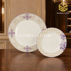 Beige and purple Green Crockery dinner set displayed on a luxury wooden table