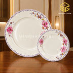 Ivory and pink rose Green Crockery dinner set on a luxury wooden table