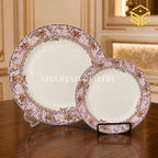 Lavender and gold Green Crockery dinner set displayed on a luxury wooden table