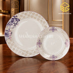 Green Crockery pink floral dinner set displayed on a luxury wooden dining table