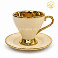 Ivory and gold luxury cup and saucer set on white background – Sharjah Centre Multan