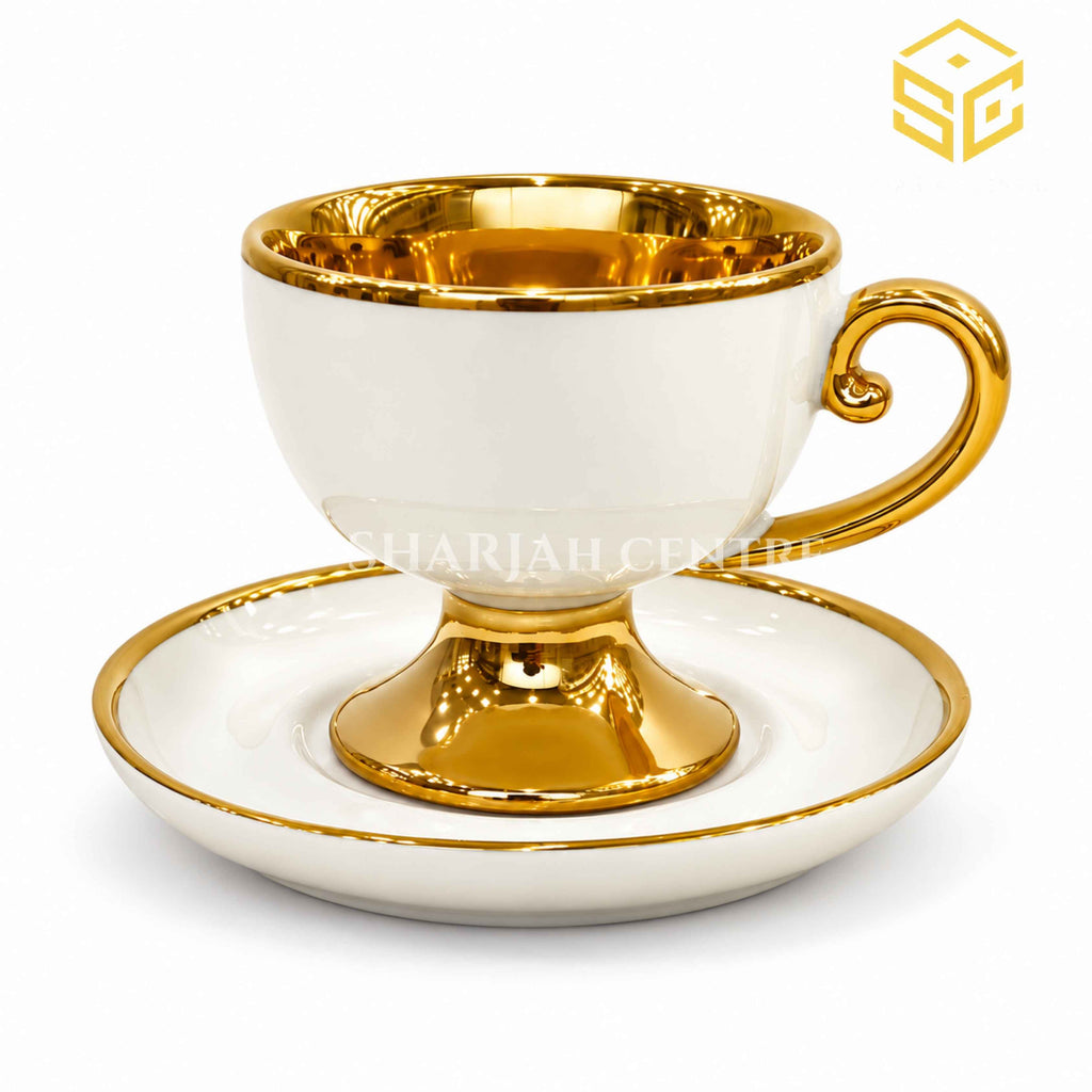 Ivory white and gold scroll handle cup and saucer on white background – Sharjah Centre Multan