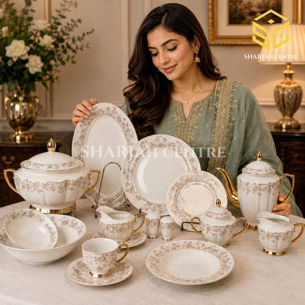 Johanson Bros 61-piece fine bone china dinner set with ivory finish, gold floral borders and serving pieces for 8 persons