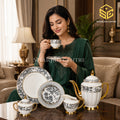 Johanson Bros England 24-piece Super Bone tea set with 6 person serving, black rose pattern and gold-tone accents model bg