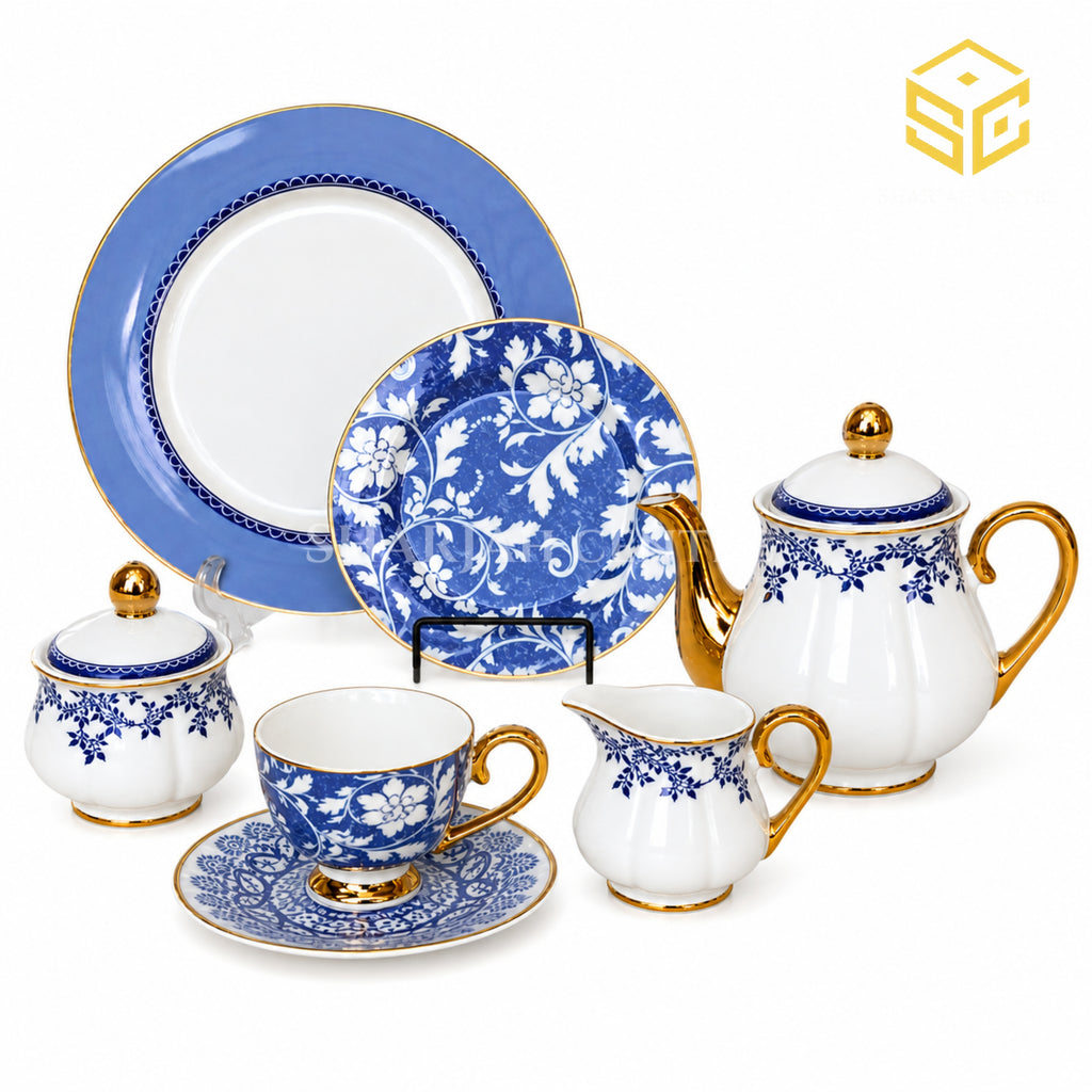Johanson Bros England 24-piece Super Bone tea set with 6 person serving, blue floral pattern and gold-tone accents white bg