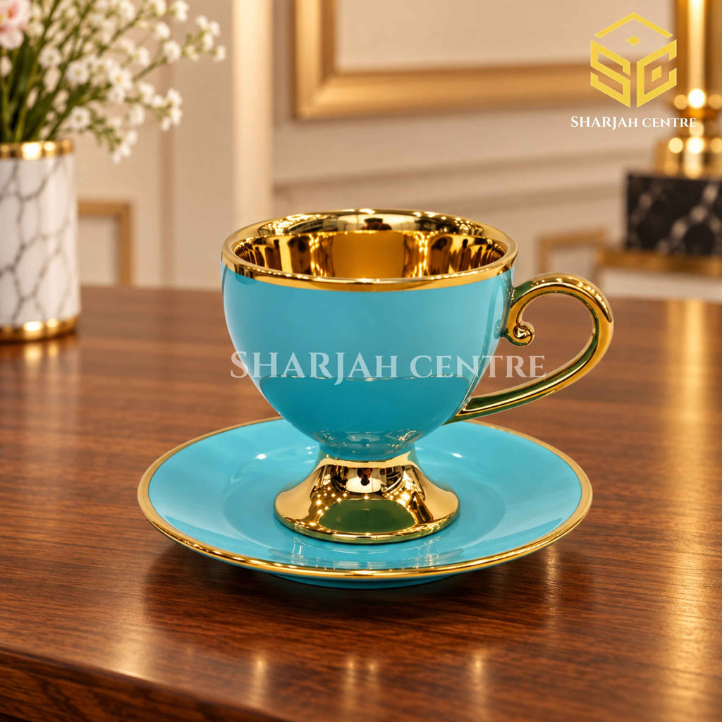 Luxury aqua turquoise and gold cup and saucer on wooden table – Sharjah Centre