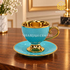 Luxury aqua turquoise and gold cup and saucer on wooden table – Sharjah Centre