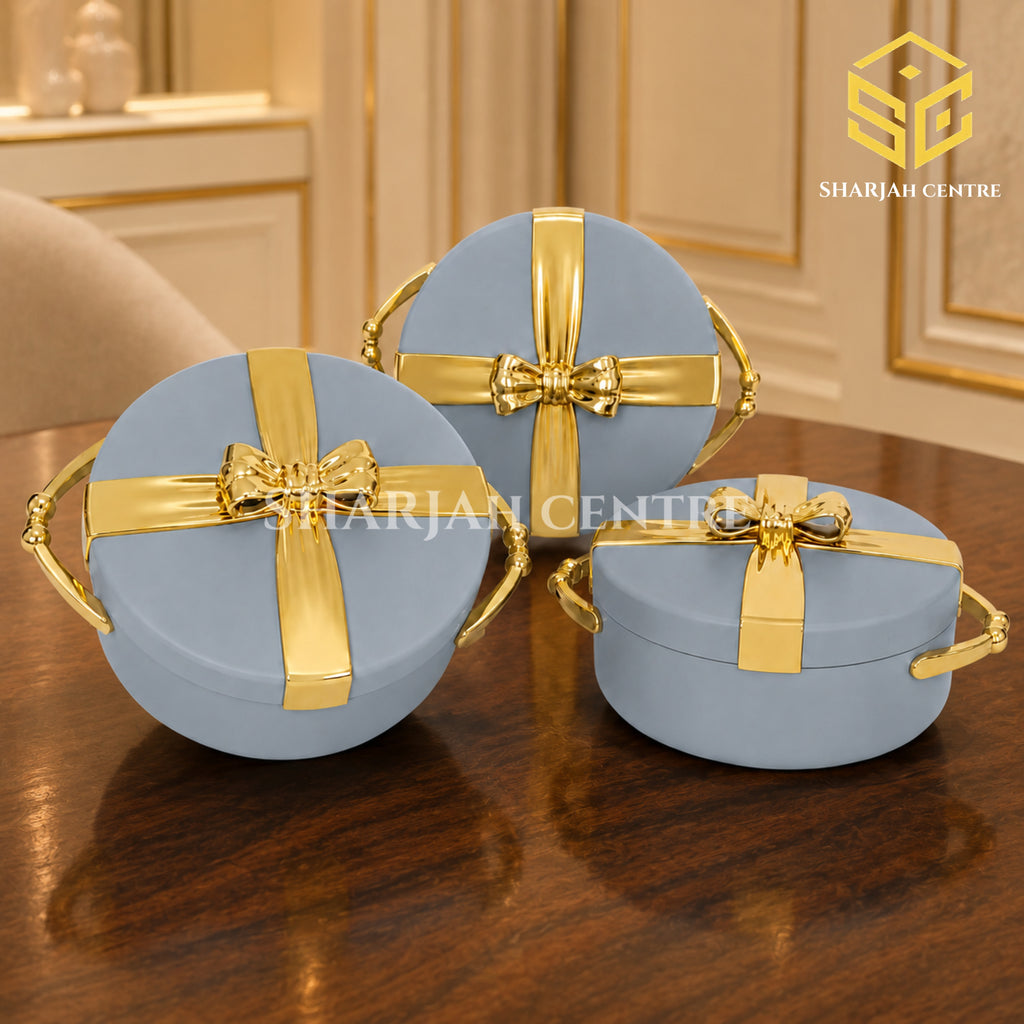Dove-grey and gold 3-piece insulated hotpot set displayed on a luxury wooden dining table