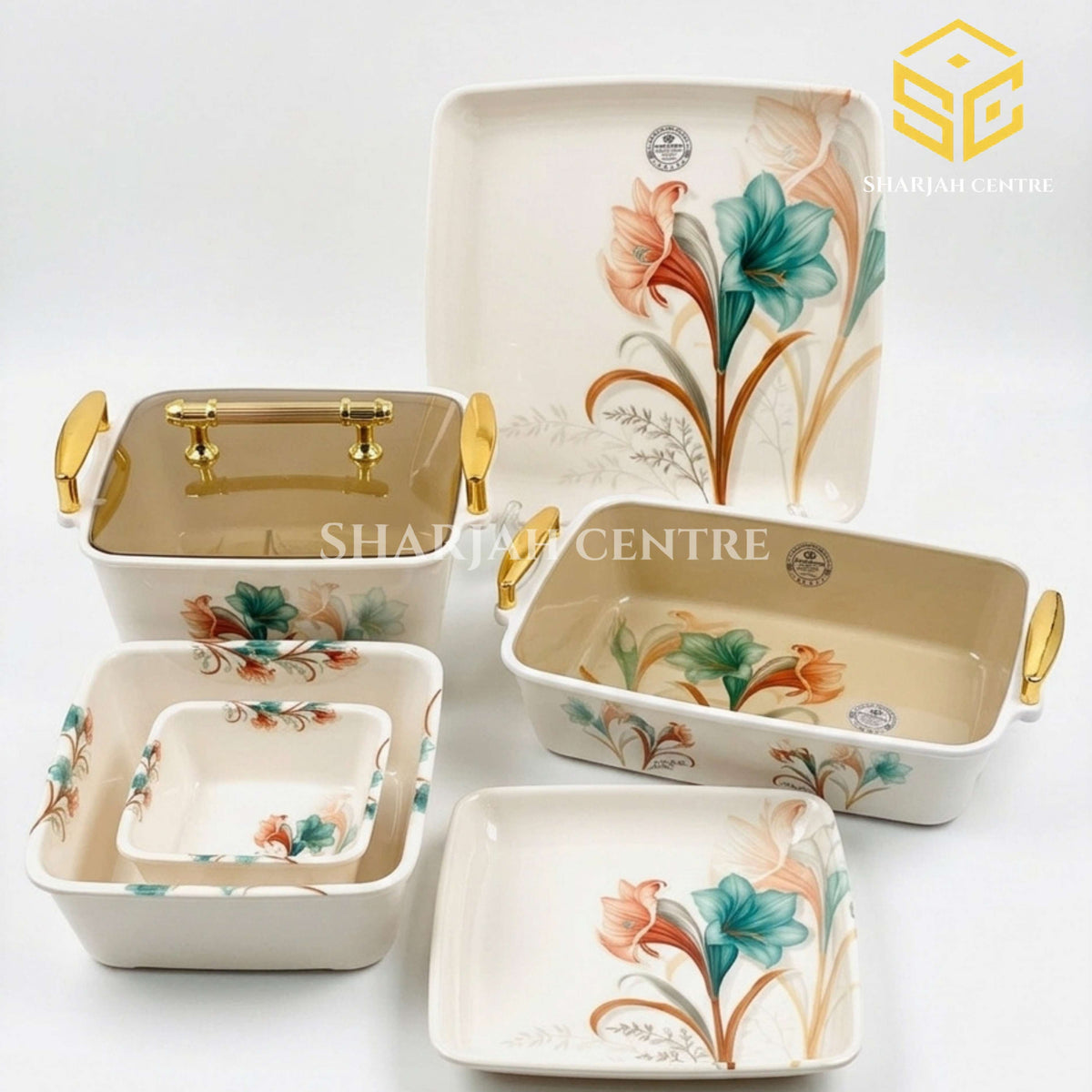 Modern teal and peach floral dinnerware is displayed against a white background with matching square bowls and an open serving dish.