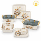 Modern ivory square dinnerware features golden-brown floral artwork, grey leaves and smoky lids with gold-tone handles against a white background.