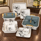 Modern Gold floral melamine dinnerware, square serving dishes with smoky lids, gold-tone handles, wooden dining table