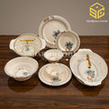 Modern Nice 77 piece melamine dinner set, blue floral dinnerware sets, melamine plates, melamine bowls, gold handle serving dishes, luxury wooden table, Sharjah Centre Multan