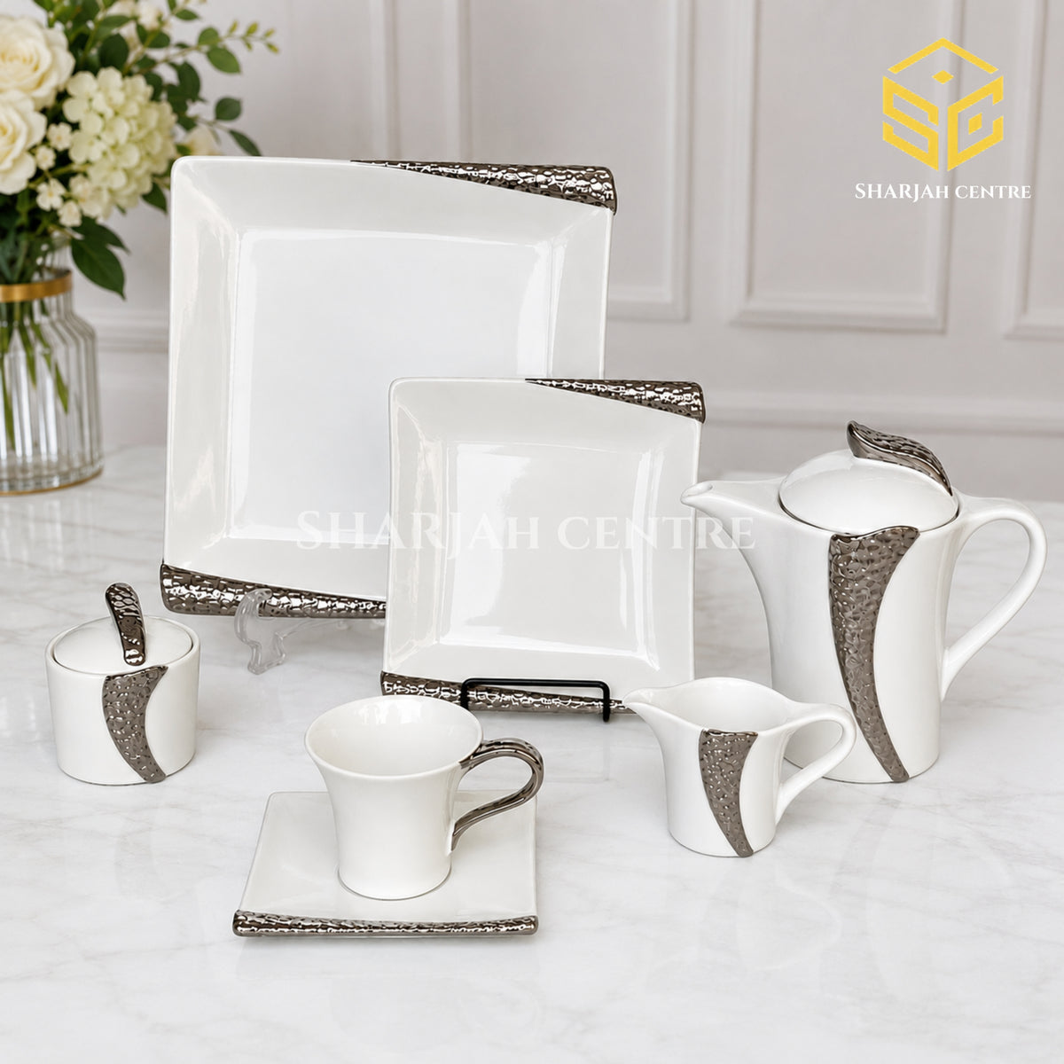 N C England Model 24-piece Super Bone tea set with 6 person serving, square plates and textured silver-tone accents color bg