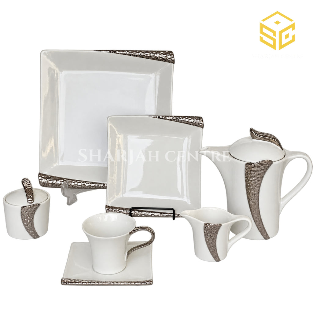 N C England Model 24-piece Super Bone tea set with 6 person serving, square plates and textured silver-tone accents white bg