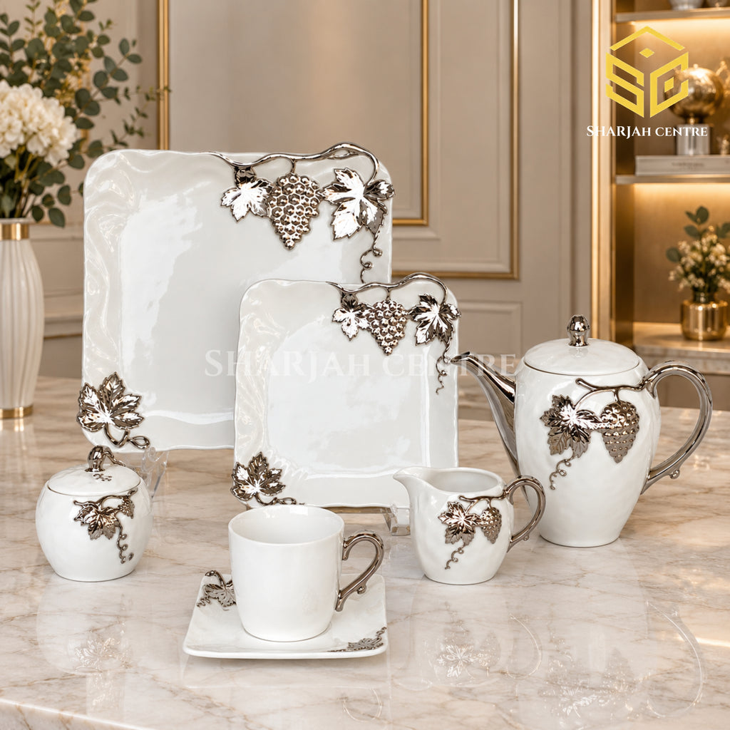 N C England Model 24-piece Super Bone tea set with 6 person serving, square plates and silver grapevine design color bg