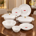 Neorah white dinner set, gold-detail serving lids, plates and bowls, luxury wooden table