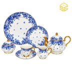 Royal Albart England 24-piece porcelain tea set with 6 person serving, blue rose pattern and gold-tone accents white bg