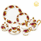 Royal Albart England 24-piece porcelain tea set with 6 person serving, purple and yellow roses and gold-tone accents white bg