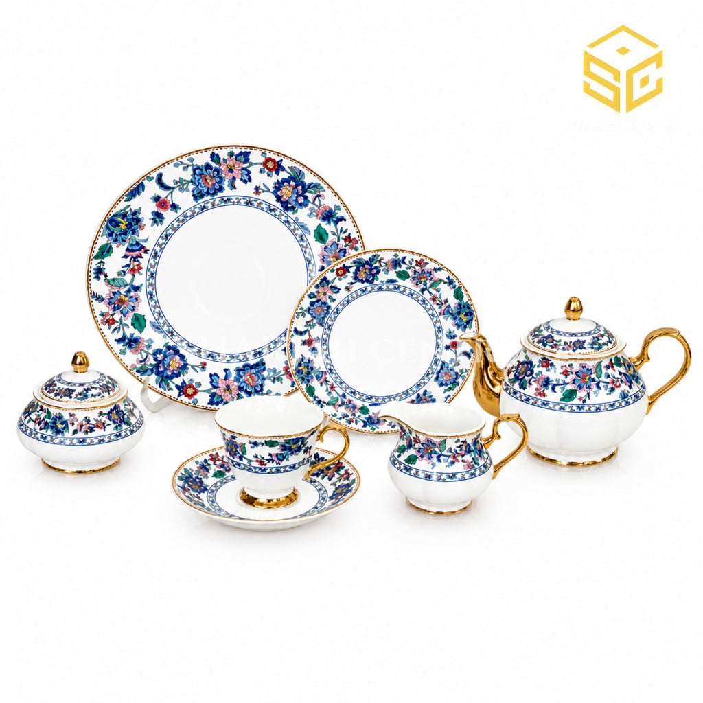 Royal Albert England 24-piece porcelain tea set with 6 person serving, blue floral borders and gold-tone accents white bg