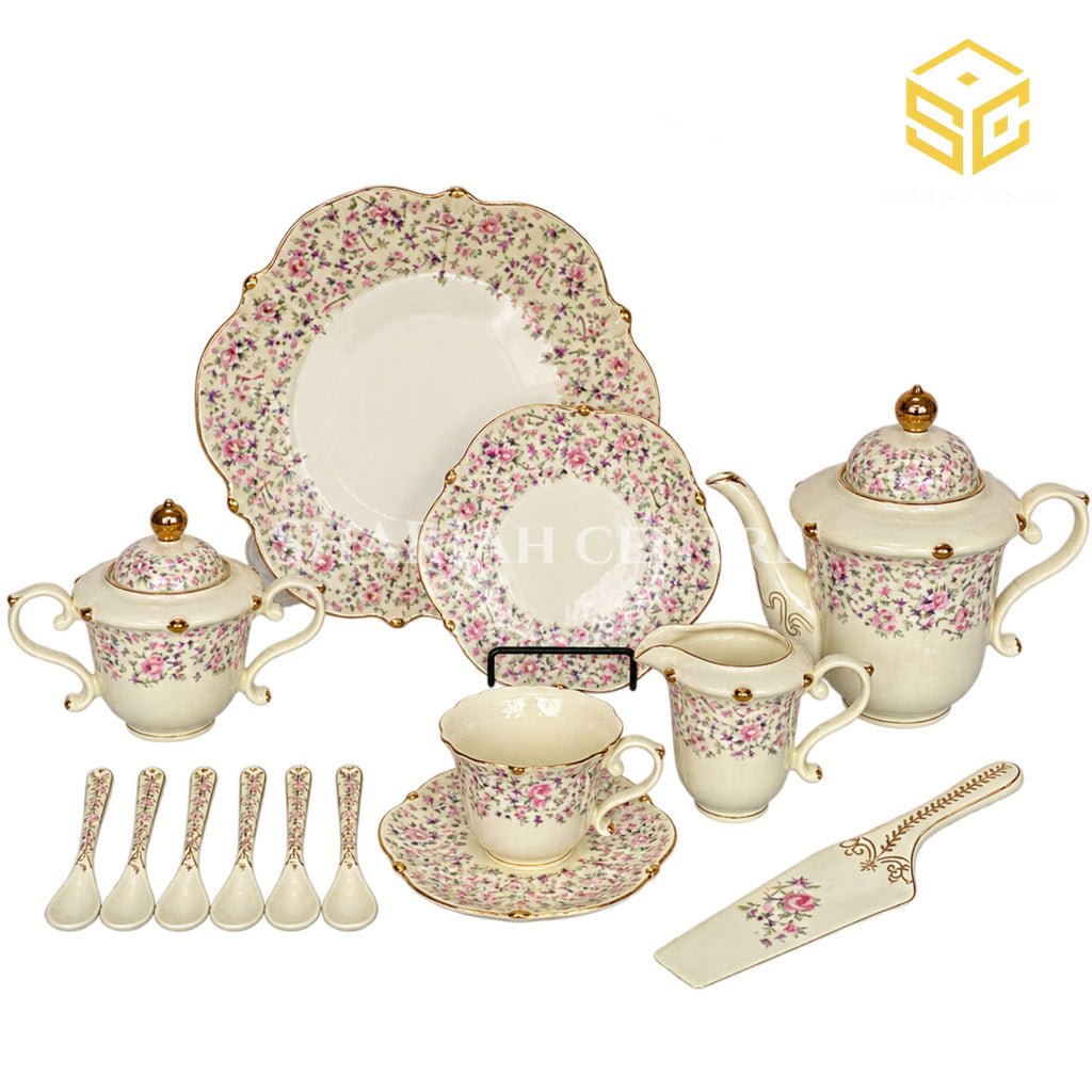 Royal Albert England 31-piece porcelain tea set with 6 person serving, pink florals and gold-tone accents white bg