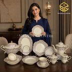 Royal Albert England ivory dinner set with delicate pink floral pattern, scalloped edges and gold-toned detailing model bg