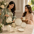 Sharjah Import 24-piece Super Bone tea set with 6 person serving, ivory petal design and delicate gold-tone detailing model bg