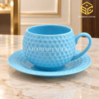 sky blue cup and saucer, pebble texture, luxury tea crockery, marble table setting, Sharjah Centre Multan