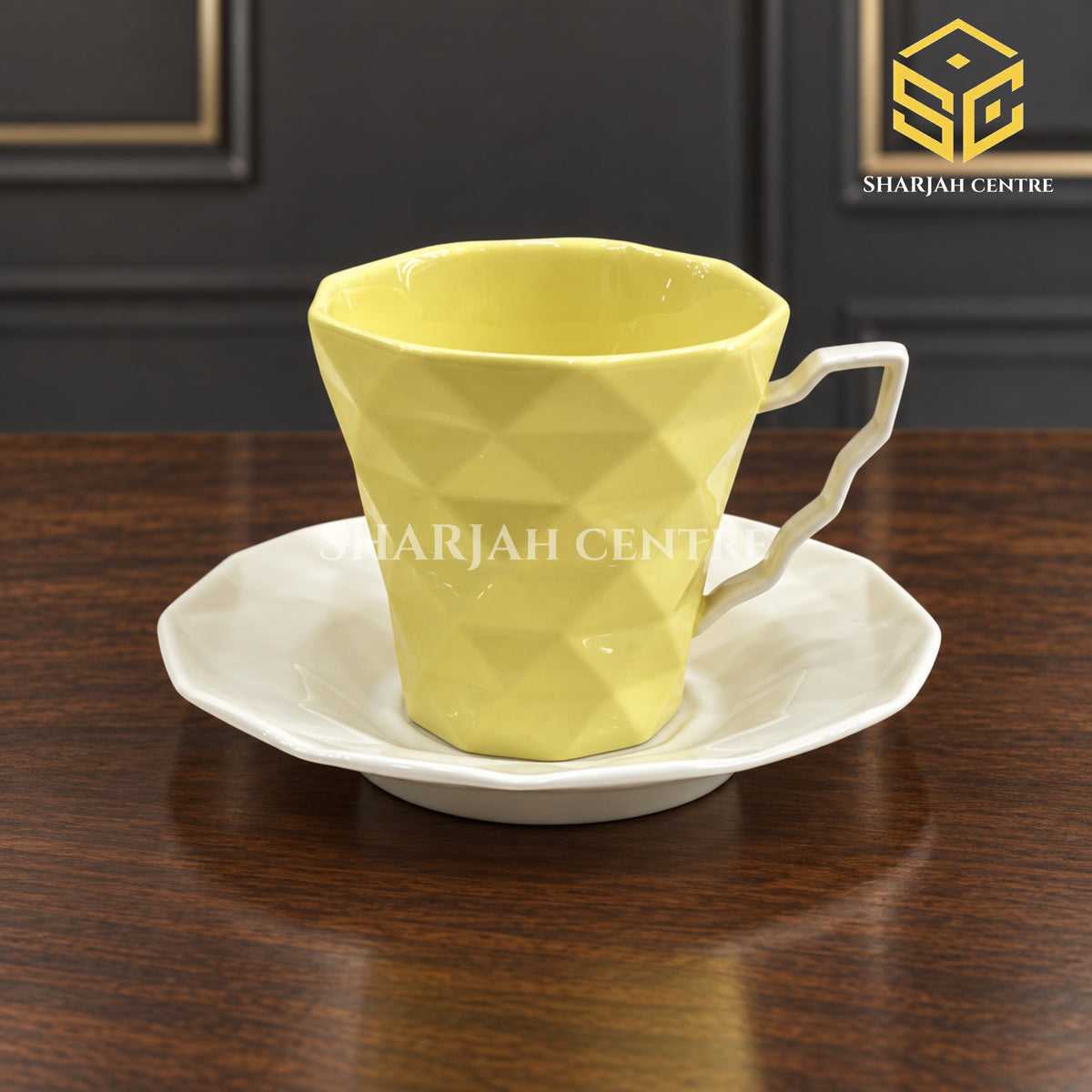 SOOGO lemon yellow cup and saucer, geometric embossed design, luxury wooden table setting, Sharjah Centre Multan