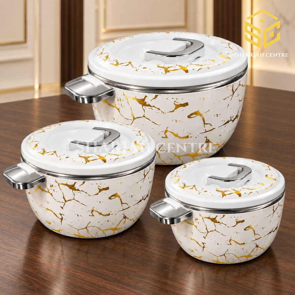 Billi white gold marble hotpot set with silver handles on a luxury walnut table