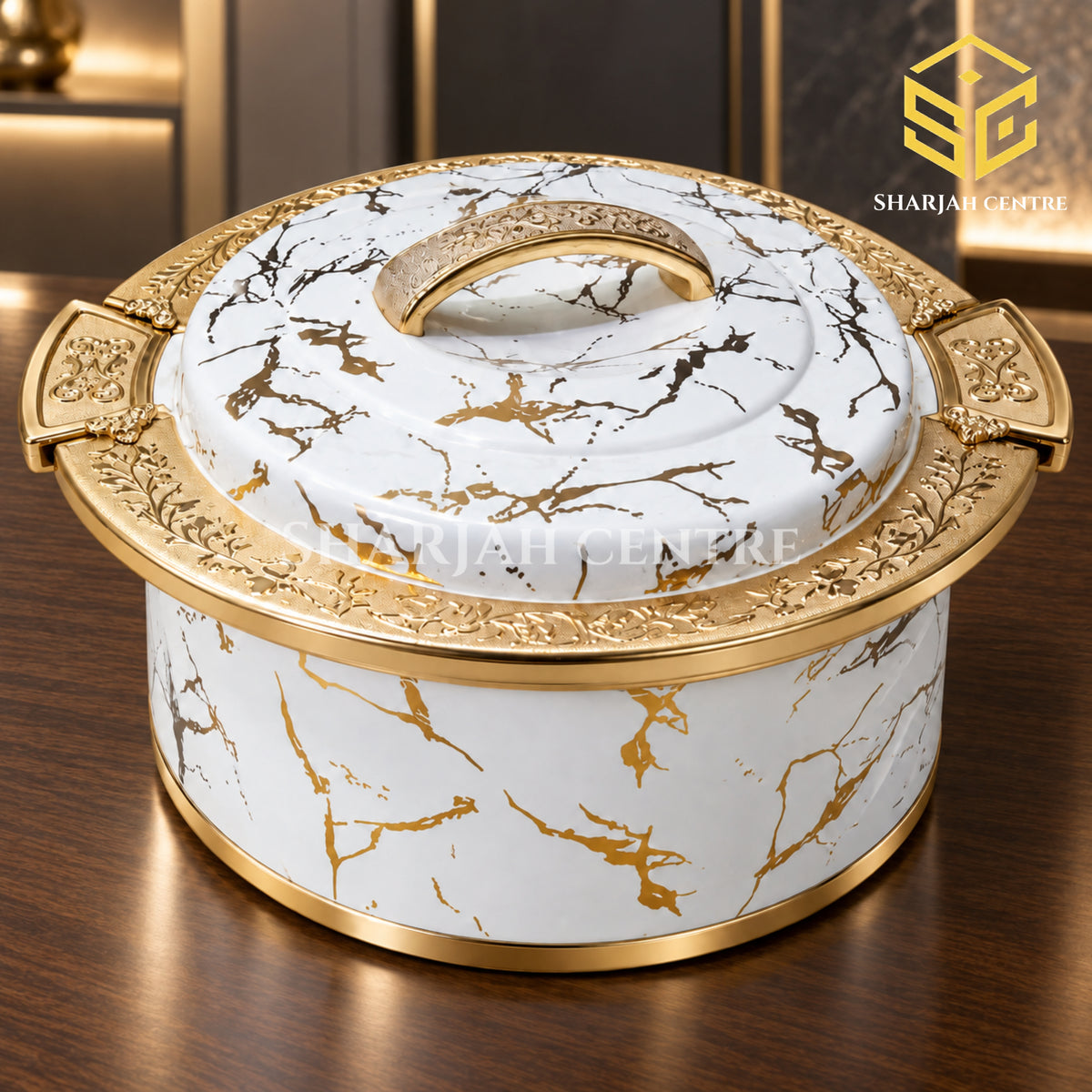 Ornate white marble and gold insulated hotpot displayed in a luxury interior